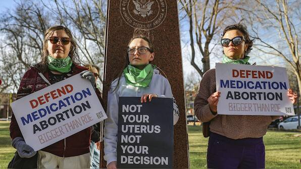 US states move court to battle over abortion pills