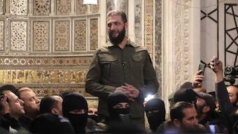 Abu Mohammed al-Jolani, the leader of Syria's Hay'at Tahrir al-Sham (HTS) group, addresses a crowd in Damascus' landmark Umayyad Mosque on December 8, 2024. Source: AFP.