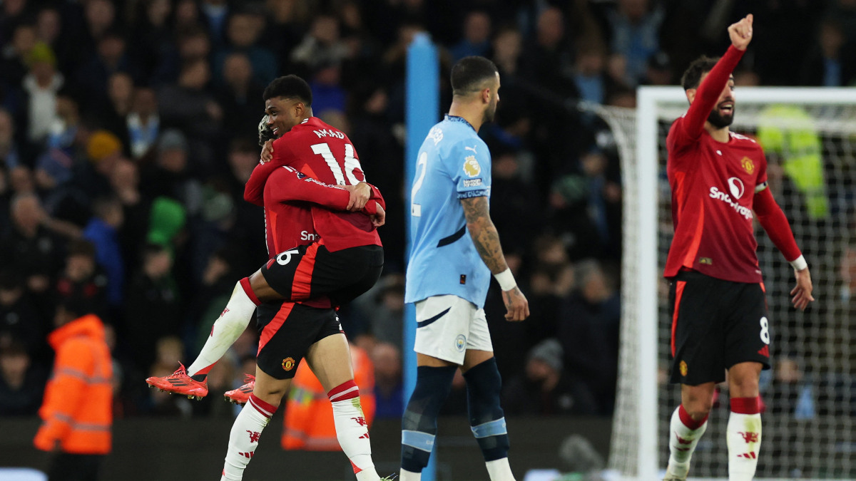 Manchester United winger Amad Diallo celebrates with teammates after scoring the winner against Manchester City at the Etihad Stadium in their Premier League derby clash on Sunday, 15 December. Reuters Manchester United winger Amad Diallo celebrates with teammates after scoring the winner against Manchester City at the Etihad Stadium in their Premier League derby clash on Sunday, 15 December. Reuters