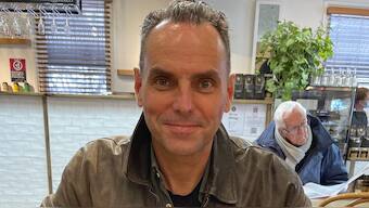 In this undated photo provided by Saffrine Duggan, her husband, former U.S. Marine Corps pilot Daniel Duggan, poses for a photo in a restaurant. File image/ AP
