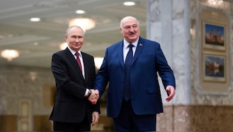 Russia's President Vladimir Putin and Belarus' President Alexander Lukashenko shake hands before a meeting of the Supreme State Council of the Union State of Russia and Belarus in Minsk, Belarus, on Friday. Reuters