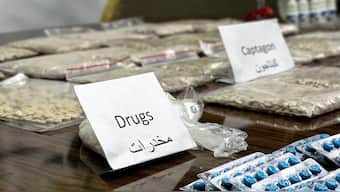 Seized drugs, including Captagon, are displayed for the media in the town of Marea, in the northern Aleppo countryside, on May 24, 2022, following clashes among different Turkey-backed factions in Syria. AFP File