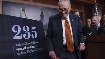 Senate Majority Leader Chuck Schumer, D-N.Y., and members of the Senate Judiciary Committee, meet with reporters to mark the confirmation of 235 federal judges nominated by President Joe Biden during the 118th Congress, at the Capitol in Washington. AP