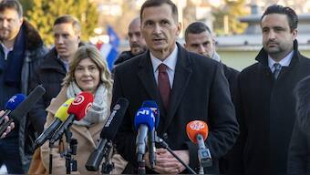 Presidential candidate of HDZ Dragan Primorac gives short statement after voting during the country's presidential elections near a polling station in Zagreb. AFP