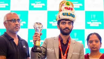 Newly-crowned chess world champion D Gukesh with his parents at an event in Chennai on Monday. PTI