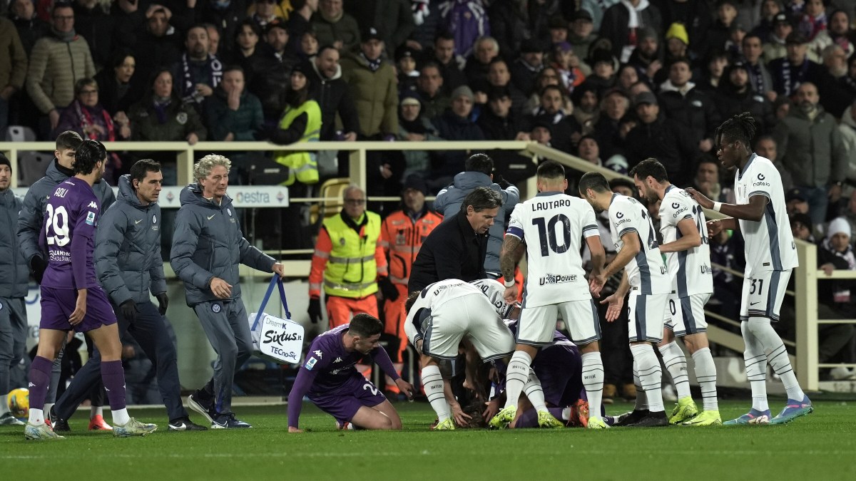 Fiorentina midfielder Edoardo Bove is surrounded by teammates as well as Inter Milan players and medical professionals after collapsing on the field during Sunday's Serie A meeting in Florence. AP Fiorentina midfielder Edoardo Bove is surrounded by teammates as well as Inter Milan players and medical professionals after collapsing on the field during Sunday's Serie A meeting in Florence. AP