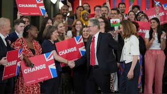 Labour Party leader Keir Starmer shakes hands with his supporters at the Tate Modern in London. File image/AP
