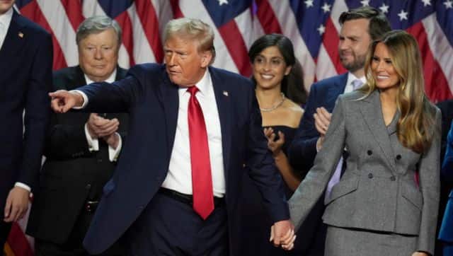 President-elect and Donald Trump holds hands with former first lady Melania Trump after speaking to supporters at the Palm Beach County Convention Center. File Image/AP