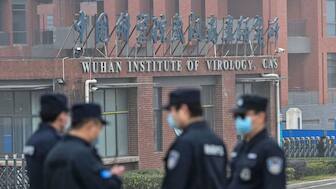 Security personnel stand guard outside the Wuhan Institute of Virology (WIV) during the Feb. 3 visit of the World Health Organization (WHO) team investigating the origins of the SARS-CoV-2, the virus that triggered the Covid-19 pandemic. (Photo: AFP)