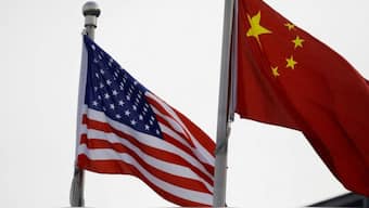 Chinese and US flags flutter outside the building of an American company in Beijing, China January 21, 2021. (Photo: Reuters)