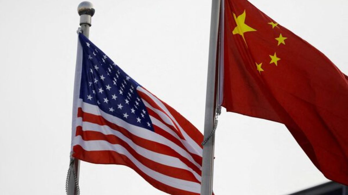 Chinese and US flags flutter outside the building of an American company in Beijing, China. Reuters Chinese and US flags flutter outside the building of an American company in Beijing, China. Reuters