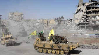 The photograph shows US-backed Kurdish military personnel of the Syrian Democratic Forces (SDF) in Syria's Raqqa in 2017. (Photo: Reuters)