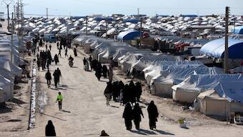 Women walk at Al-Hol prison housing Islamic State terrorists and their families in Hasaka governorate, Syria, on April 1, 2019. (Photo: Reuters)
