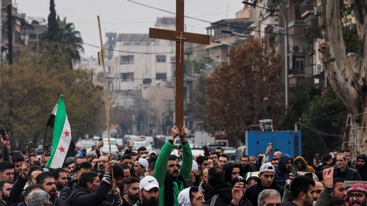 Protests in Syria after Christmas tree was set on fire; HTS promises repair, says culprits arrested