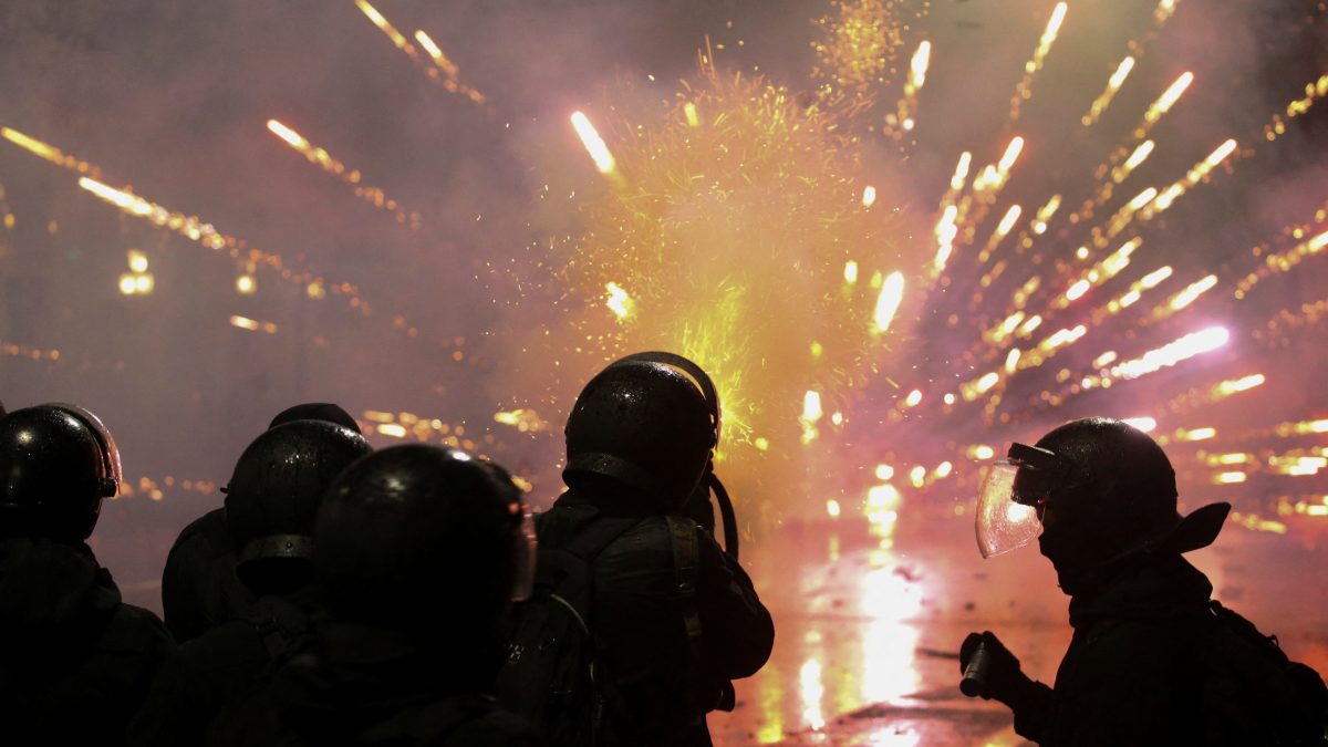 A law enforcement officer fires a tear gas canister as fireworks explode during a protest against the new government's decision to suspend the European Union accession talks and refuse budgetary grants until 2028, in Tbilisi, Georgia. Reuters A law enforcement officer fires a tear gas canister as fireworks explode during a protest against the new government's decision to suspend the European Union accession talks and refuse budgetary grants until 2028, in Tbilisi, Georgia. Reuters