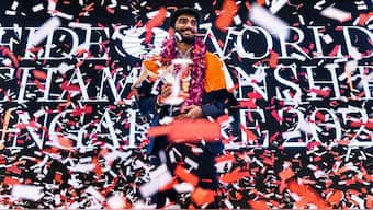 D Gukesh poses with the World Chess Championship trophy at the closing ceremony of the 2024 edition. PTI 
