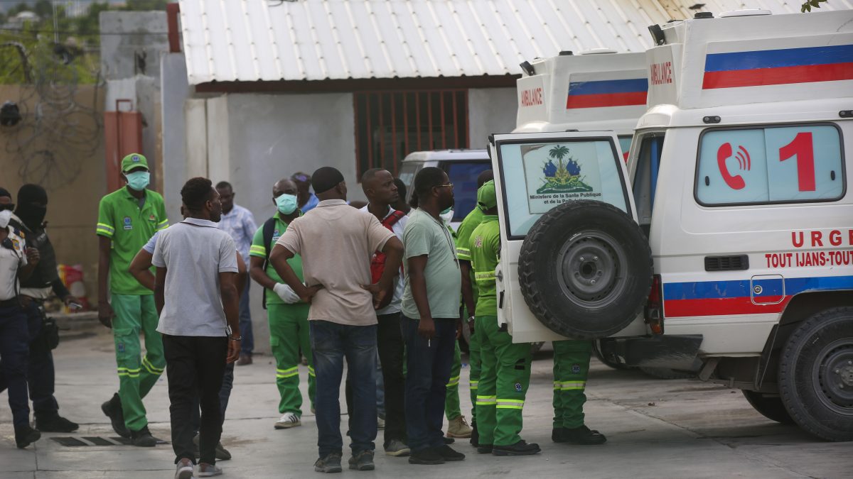 Medics inspect an ambulance of wounded people, shot by armed gangs at the General Hospital, in Port-au-Prince, Haiti. AP Medics inspect an ambulance of wounded people, shot by armed gangs at the General Hospital, in Port-au-Prince, Haiti. AP