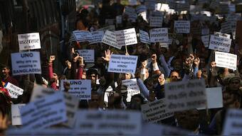 People shout slogans condemning reported attacks on Hindu and other minorities in Bangladesh during a protest near the Bangladesh diplomatic mission in New Delhi, India. AP