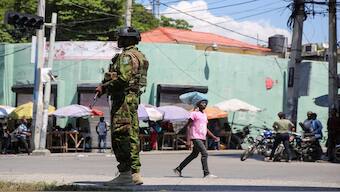 A Kenyan police officer patrols as the country is facing emergency food insecurity while immersed in a social and political crisis, in Port-au-Prince, Haiti, on October 3, 2024. Reuters File