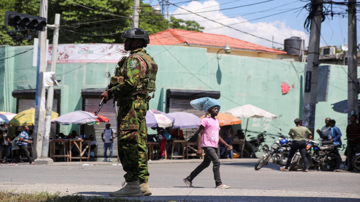 A Kenyan police officer patrols as the country is facing emergency food insecurity while immersed in a social and political crisis, in Port-au-Prince, Haiti, on October 3, 2024. Reuters File A Kenyan police officer patrols as the country is facing emergency food insecurity while immersed in a social and political crisis, in Port-au-Prince, Haiti, on October 3, 2024. Reuters File