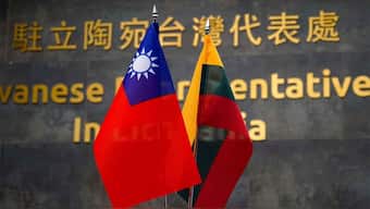 (File) Taiwanese and Lithuanian flags are displayed at the Taiwanese Representative Office in Vilnius, Lithuania January 20, 2022. Reuters