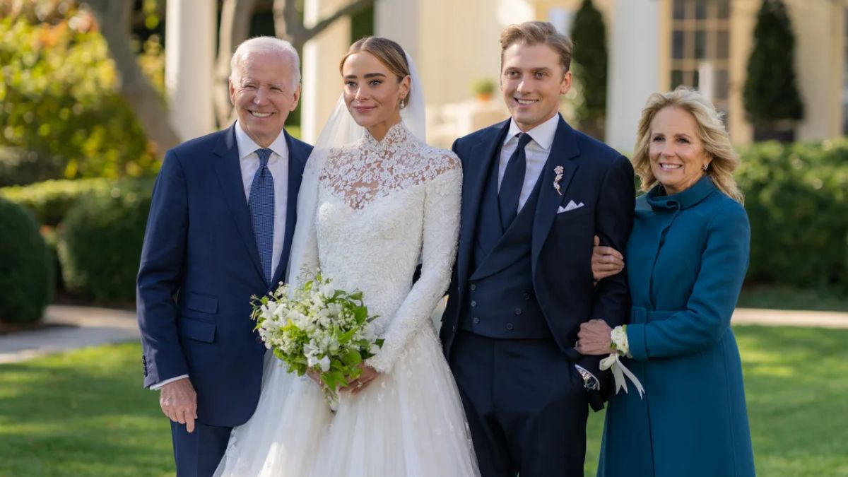 President Joe Biden and First Lady Jill Biden pose for a photo with their granddaughter, Naomi, and her husband Neal. Image courtesy: White House President Joe Biden and First Lady Jill Biden pose for a photo with their granddaughter, Naomi, and her husband Neal. Image courtesy: White House