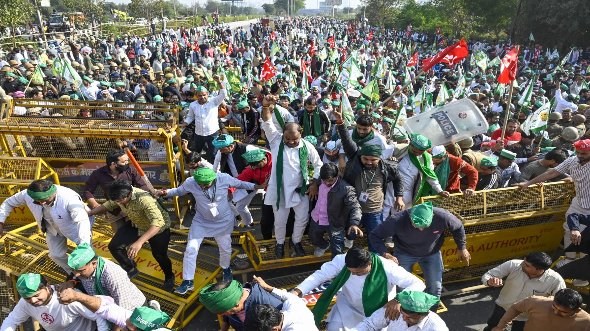 Farmers and Kisan Ekta Sangh members break police barricades during their protest march demanding for the expansion of minimum support prices (MSP) and other benefits, in Noida, Monday, December 2, 2024. PTI Farmers and Kisan Ekta Sangh members break police barricades during their protest march demanding for the expansion of minimum support prices (MSP) and other benefits, in Noida, Monday, December 2, 2024. PTI