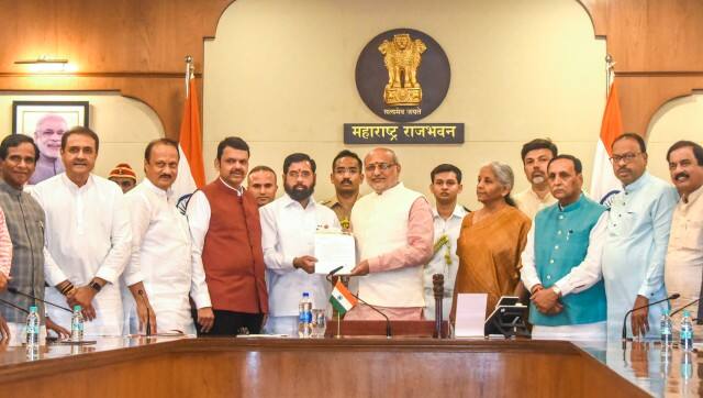 BJP leader Devendra Fadnavis along with NCP leader Ajit Pawar, Shiv Sena leader Eknath Shinde and BJP Central Observers Nirmala Sitharaman and Vijay Rupani meets Maharashtra Governor C P Radhakrishnan to stake claim for formation of the new government, in Mumbai, Wednesday, December 4, 2024. PTI 
