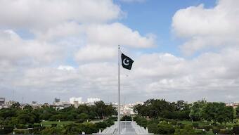 Pakistan's national flag flatters during a ceremony to celebrate Pakistan's 75th Independence Day, at the Mausoleum of Muhammad Ali Jinnah in Karachi, Pakistan. File image/ Reuters
