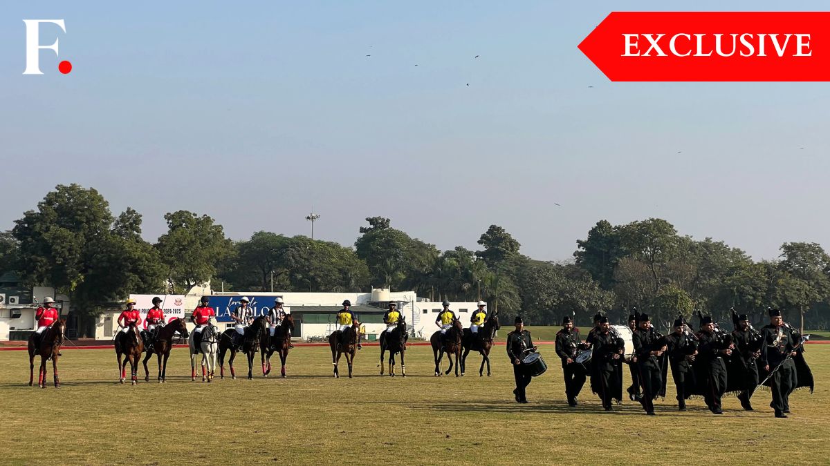 Polo players from the Mayfair Polo team and the Delta Polo team, as well as the umpires line up as the Army pipes and drums commence the final of the Col. Girdhari Memorial Polo Cup at the Jaipur Polo Ground in New Delhi, December 1, 2024. Firstpost/Anmol Singla Polo players from the Mayfair Polo team and the Delta Polo team, as well as the umpires line up as the Army pipes and drums commence the final of the Col. Girdhari Memorial Polo Cup at the Jaipur Polo Ground in New Delhi, December 1, 2024. Firstpost/Anmol Singla