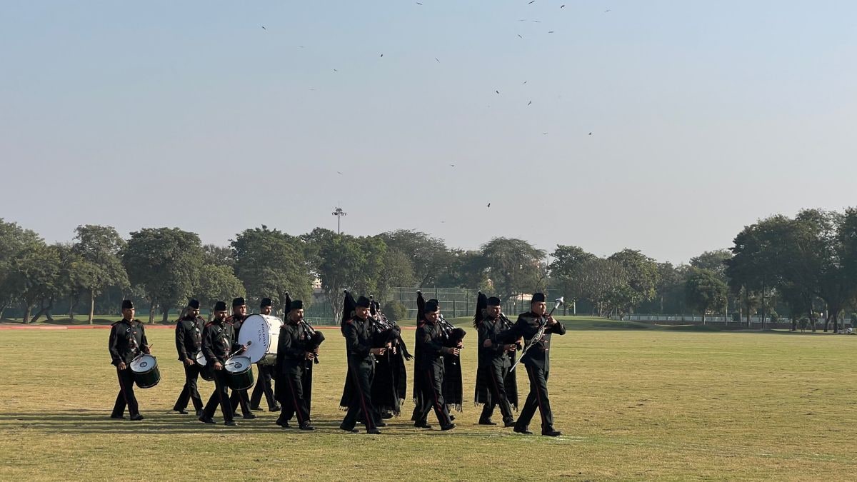 Band members of the Army pipes and drums perform at the final of the Col. Girdhari Memorial Polo Cup at the Jaipur Polo Ground in New Delhi, December 1, 2024.