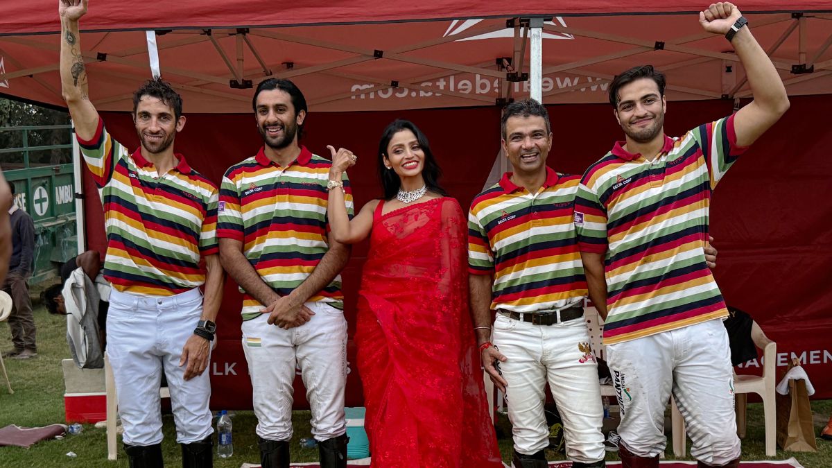 Patron of the Delta Polo team, Dr. Aishwarya Paliwal (centre) celebrates with the Jaipur Delta polo team comprising (L to R) Santiago Marambio, Sawai Padmanabh Singh, Lt Col Vishal Chauhan and Syed Hurr Ali, after winning the Sir Pratap Singh Polo Cup at the Jaipur Polo Ground in New Delhi, November 17, 2024. Firstpost via Delta Polo Foundation