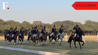 Equestrians from the President's Bodyguard led by Colonel Amit Berwal, commandant of the PBG (right) can be seen giving a riding salute to the crowd at the President's Polo Cup held at the President's Bodyguard Parade Ground in New Delhi, December 14, 2024. Firstpost/Anmol Singla