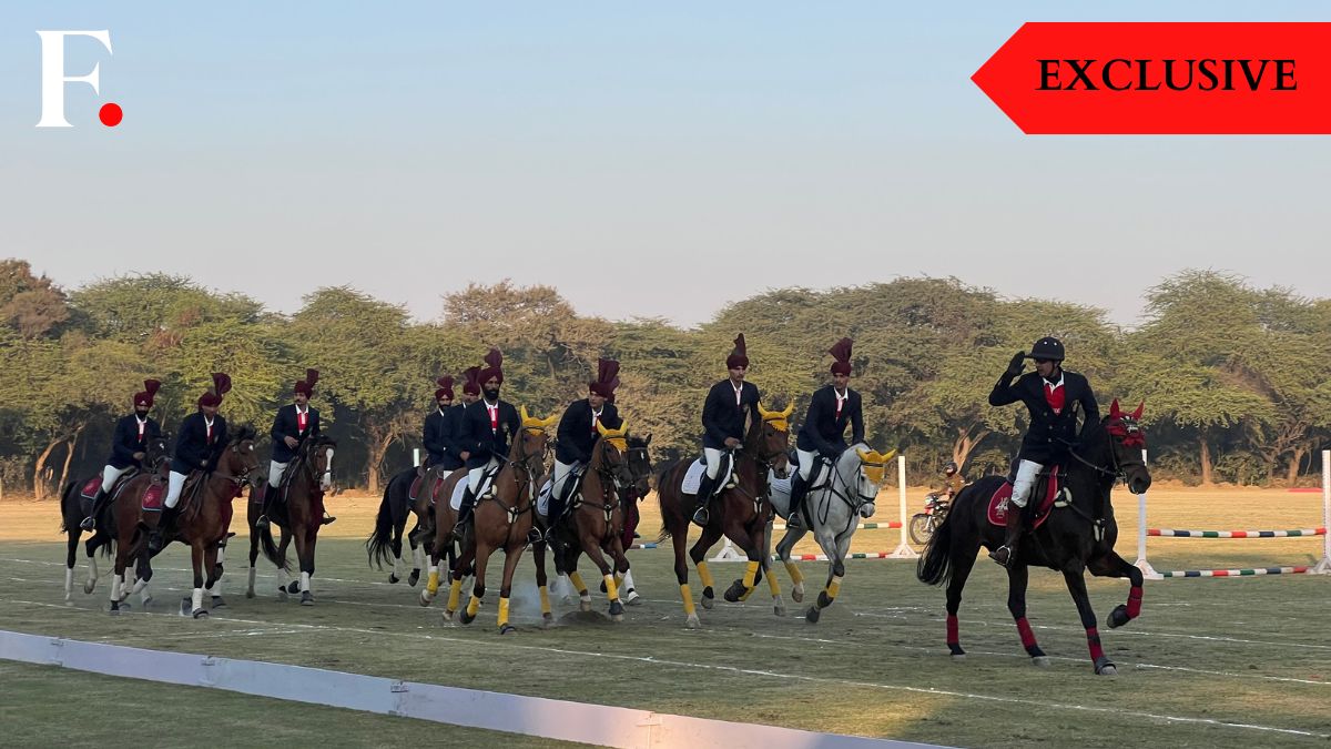 Equestrians from the President's Bodyguard led by Colonel Amit Berwal, commandant of the PBG (right) can be seen giving a riding salute to the crowd at the President's Polo Cup held at the President's Bodyguard Parade Ground in New Delhi, December 14, 2024. Firstpost/Anmol Singla Equestrians from the President's Bodyguard led by Colonel Amit Berwal, commandant of the PBG (right) can be seen giving a riding salute to the crowd at the President's Polo Cup held at the President's Bodyguard Parade Ground in New Delhi, December 14, 2024. Firstpost/Anmol Singla