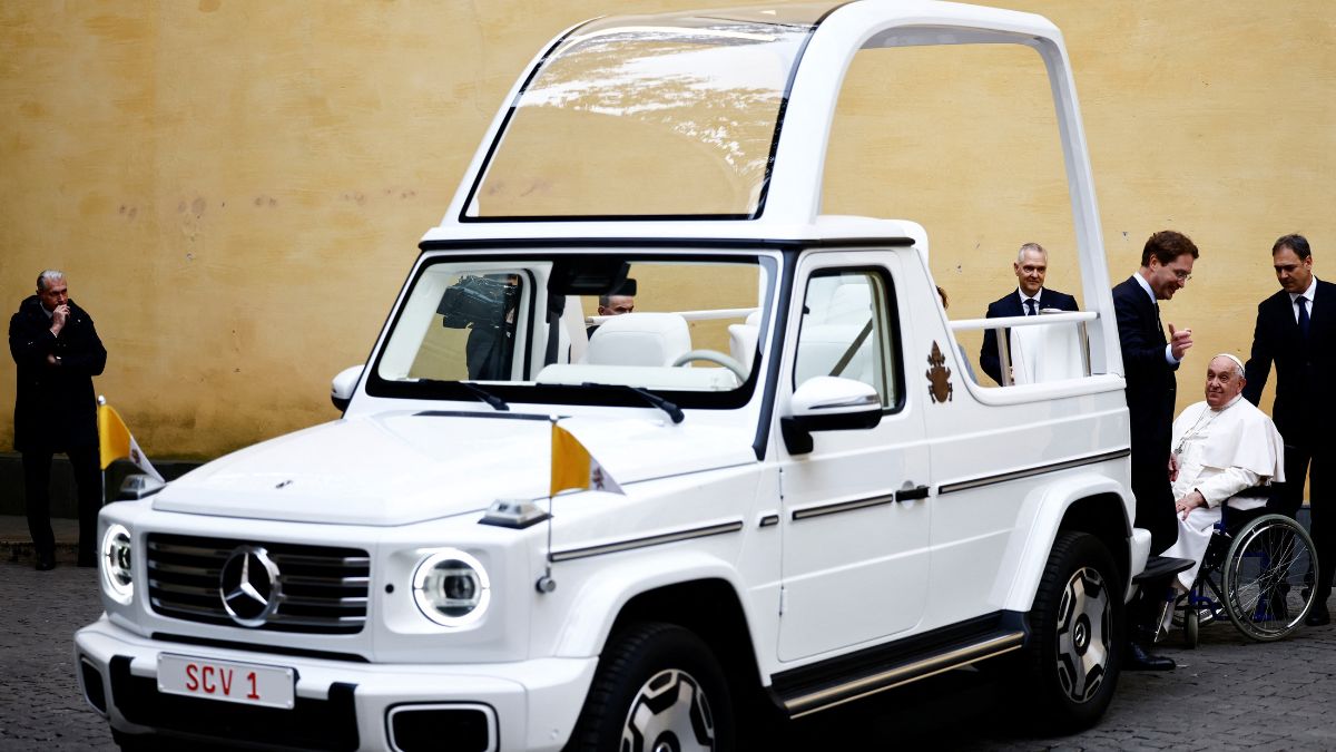 Pope Francis reacts as he receives a new open popemobile next to Mercedes-Benz Group CEO Ola Kallenius at the Vatican. Reuters Pope Francis reacts as he receives a new open popemobile next to Mercedes-Benz Group CEO Ola Kallenius at the Vatican. Reuters