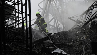A Ukrainian rescuer works at the site of a drone strike at a warehouse building in the Boryspil district of Kyiv region on December 20, 2024, amid the Russian invasion of Ukraine. File image/AFP