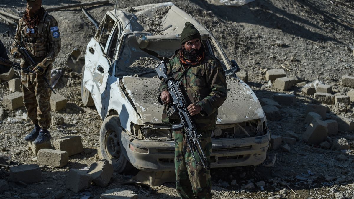 Taliban security personnel stand guard near a damaged car two days after air strikes by Pakistan in the Barmal district of eastern Paktika province on December 26, 2024. Image- AFP Taliban security personnel stand guard near a damaged car two days after air strikes by Pakistan in the Barmal district of eastern Paktika province on December 26, 2024. Image- AFP