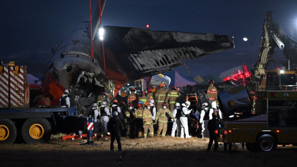 Firefighters and rescue personnel carry the body of a victim near the scene where a Jeju Air Boeing 737-800 series aircraft crashed and burst into flames at Muan International Airport in South Jeolla Province, some 288 kilometres southwest of Seoul on December 29, 2024. Image-AFP Firefighters and rescue personnel carry the body of a victim near the scene where a Jeju Air Boeing 737-800 series aircraft crashed and burst into flames at Muan International Airport in South Jeolla Province, some 288 kilometres southwest of Seoul on December 29, 2024. Image-AFP