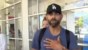 Virat Kohli got angry at a female reporter for filming him and his family at the Melbourne airport. Image: Video screengrab/7News  