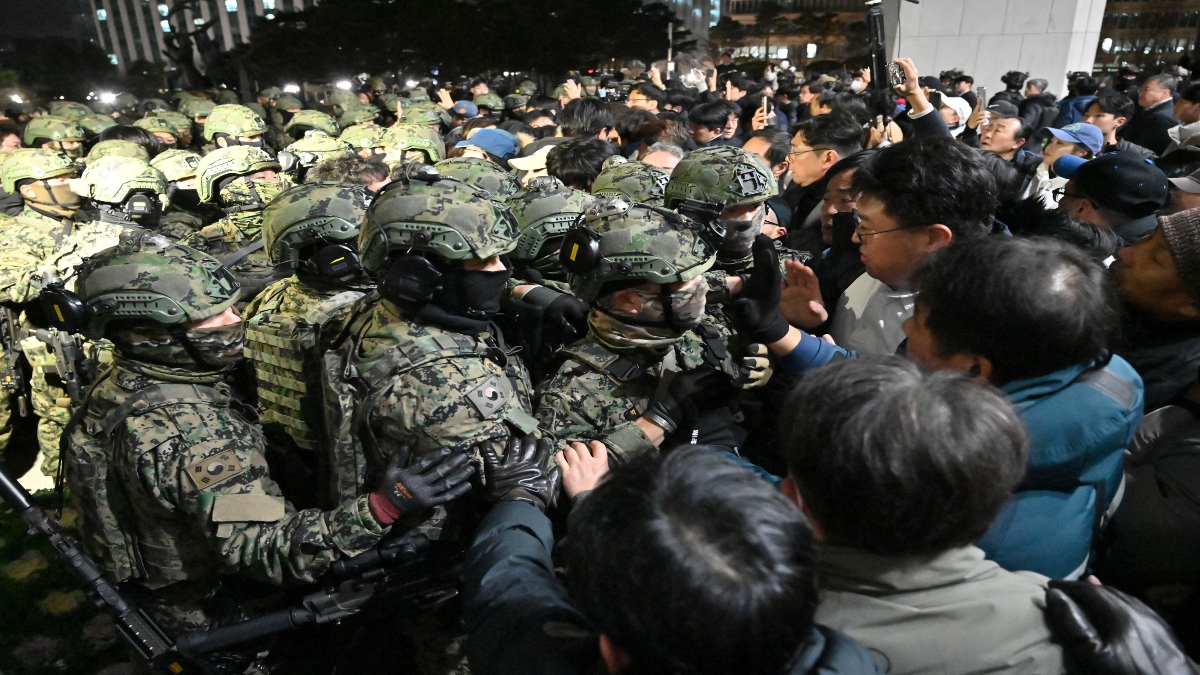 South Korean lawmakers block President Yoon's martial law decree as thousands protest South Korean lawmakers block President Yoon's martial law decree as thousands protest