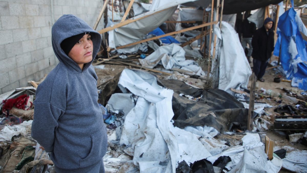 A Palestinian boy stands amidst the damage at a tent camp sheltering displaced people, following an Israeli strike, amid the Israel-Hamas conflict, in Al-Mawasi area, in Khan Younis, southern Gaza Strip. Reuters A Palestinian boy stands amidst the damage at a tent camp sheltering displaced people, following an Israeli strike, amid the Israel-Hamas conflict, in Al-Mawasi area, in Khan Younis, southern Gaza Strip. Reuters