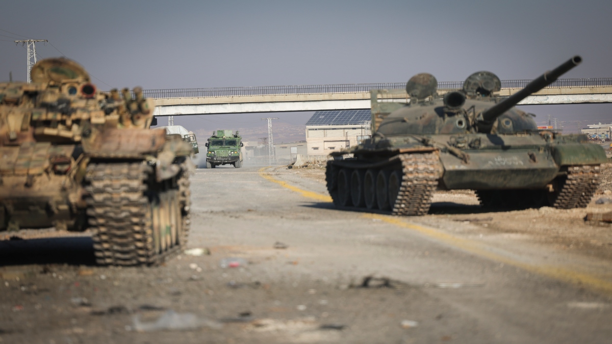 Abandoned Syrian army armoured vehicles sit on a road as opposition insurgents control the outskirts of Hama, Syria, on Tuesday. AP Abandoned Syrian army armoured vehicles sit on a road as opposition insurgents control the outskirts of Hama, Syria, on Tuesday. AP