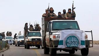 (File) Members of Hayat Tahrir al-Sham, or HTS, AP
