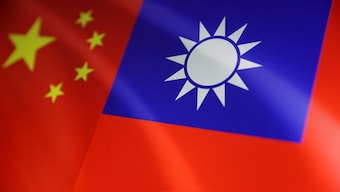 Chinese and Taiwanese flags are seen in this illustration. File image/  Reuters 