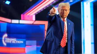 US President-elect Donald Trump gestures at Turning Point USA's AmericaFest in Phoenix, Arizona, US, December 22, 2024. Reuters