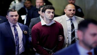 Luigi Mangione, the suspect in the killing of UnitedHealth Group executive Brian Thompson, walks on the day of an arraignment hearing, at New York Supreme Court in New York City, US on  Monday. Reuters