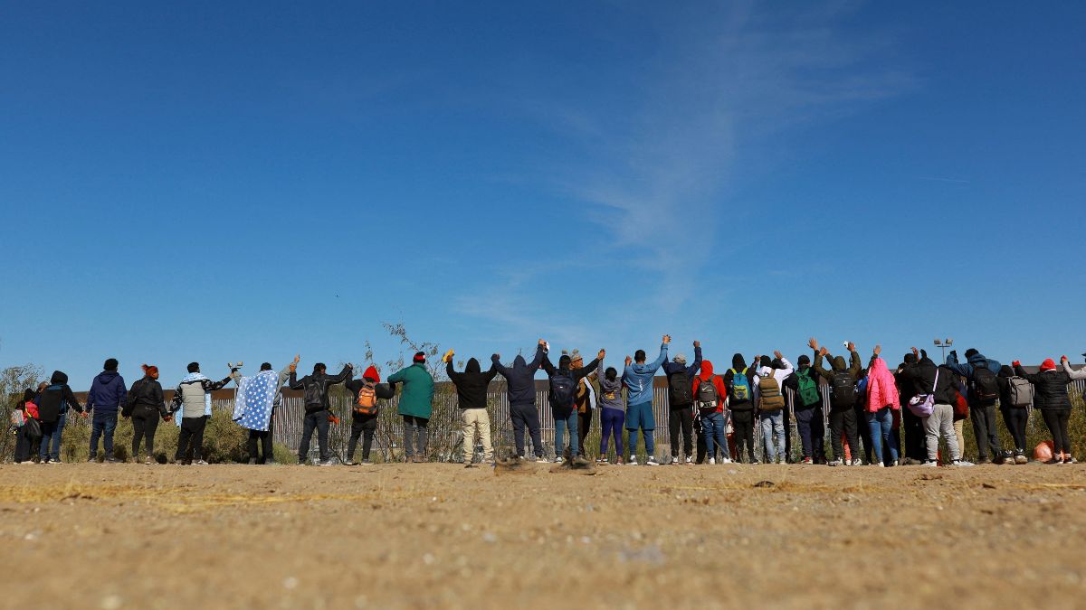 Migrants gesture while praying near the border, after rumours spread that they would be allowed to enter the United States, according to local media, in Ciudad Juarez, Mexico, December 18, 2024. File Image/Reuters Migrants gesture while praying near the border, after rumours spread that they would be allowed to enter the United States, according to local media, in Ciudad Juarez, Mexico, December 18, 2024. File Image/Reuters