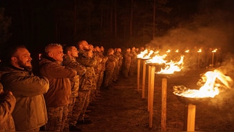 Ukrainian servicemen of 3rd assault brigade participate in memorial ceremony of their fallen comrades during the winter solstice in Kharkiv region, Ukraine, on Decemeber 22, 2024. AP File