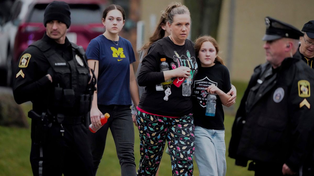 A family leave the shelter after multiple injuries were reported following a shooting at the Abundant Life Christian School, December 16, 2024. AP A family leave the shelter after multiple injuries were reported following a shooting at the Abundant Life Christian School, December 16, 2024. AP