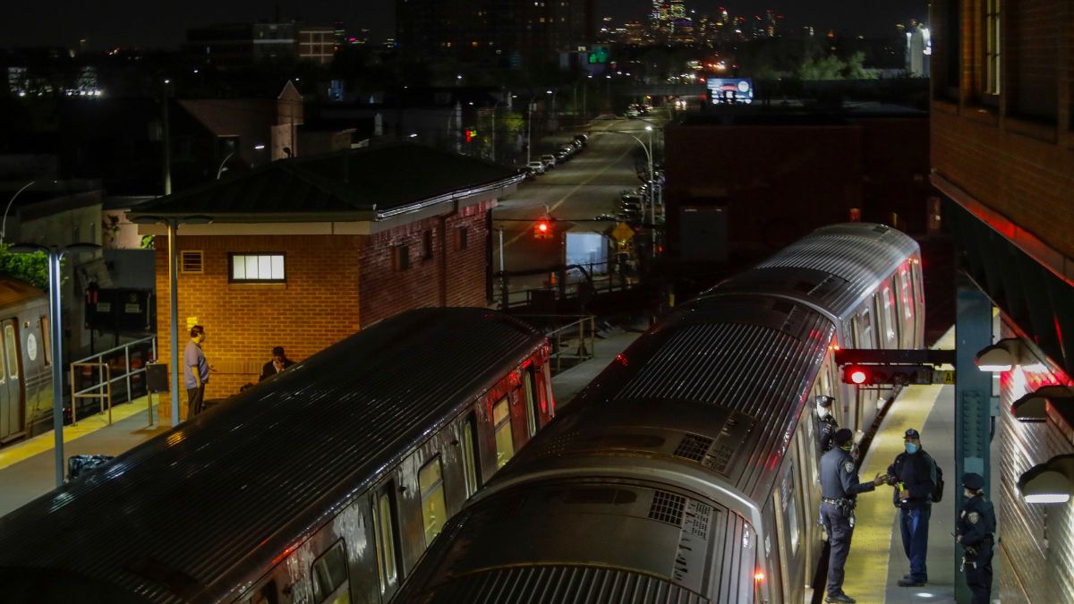 New York Police officers clear a train at the Coney Island Stillwell Avenue Terminal, May 5, 2020, in the Brooklyn borough of New York. File Photo/AP New York Police officers clear a train at the Coney Island Stillwell Avenue Terminal, May 5, 2020, in the Brooklyn borough of New York. File Photo/AP